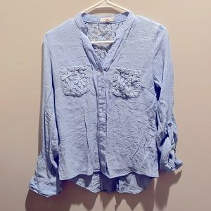 Women’s Periwinkle colored floral blouse